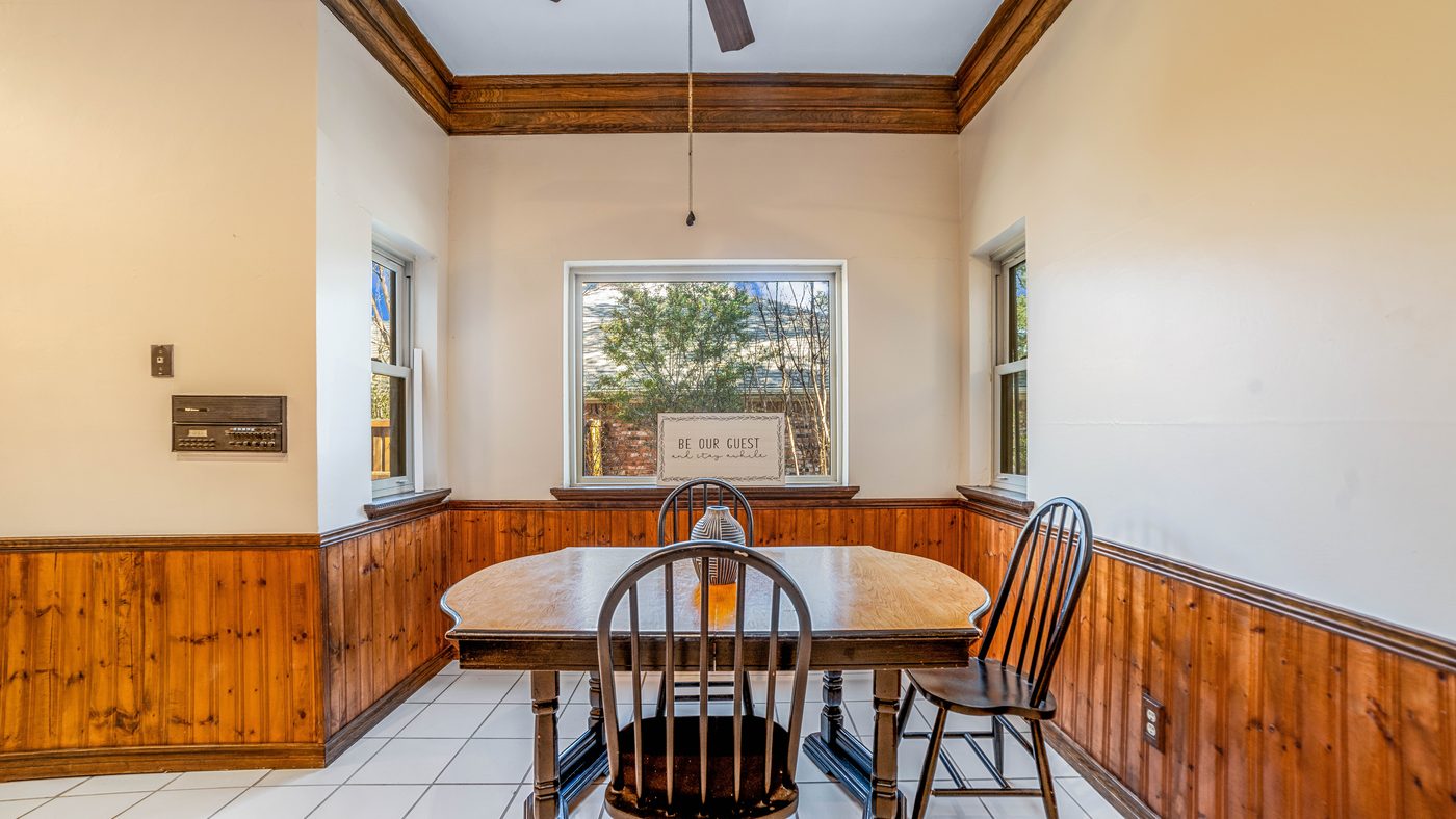 Breakfast nook with window and round table at Baffin Bay