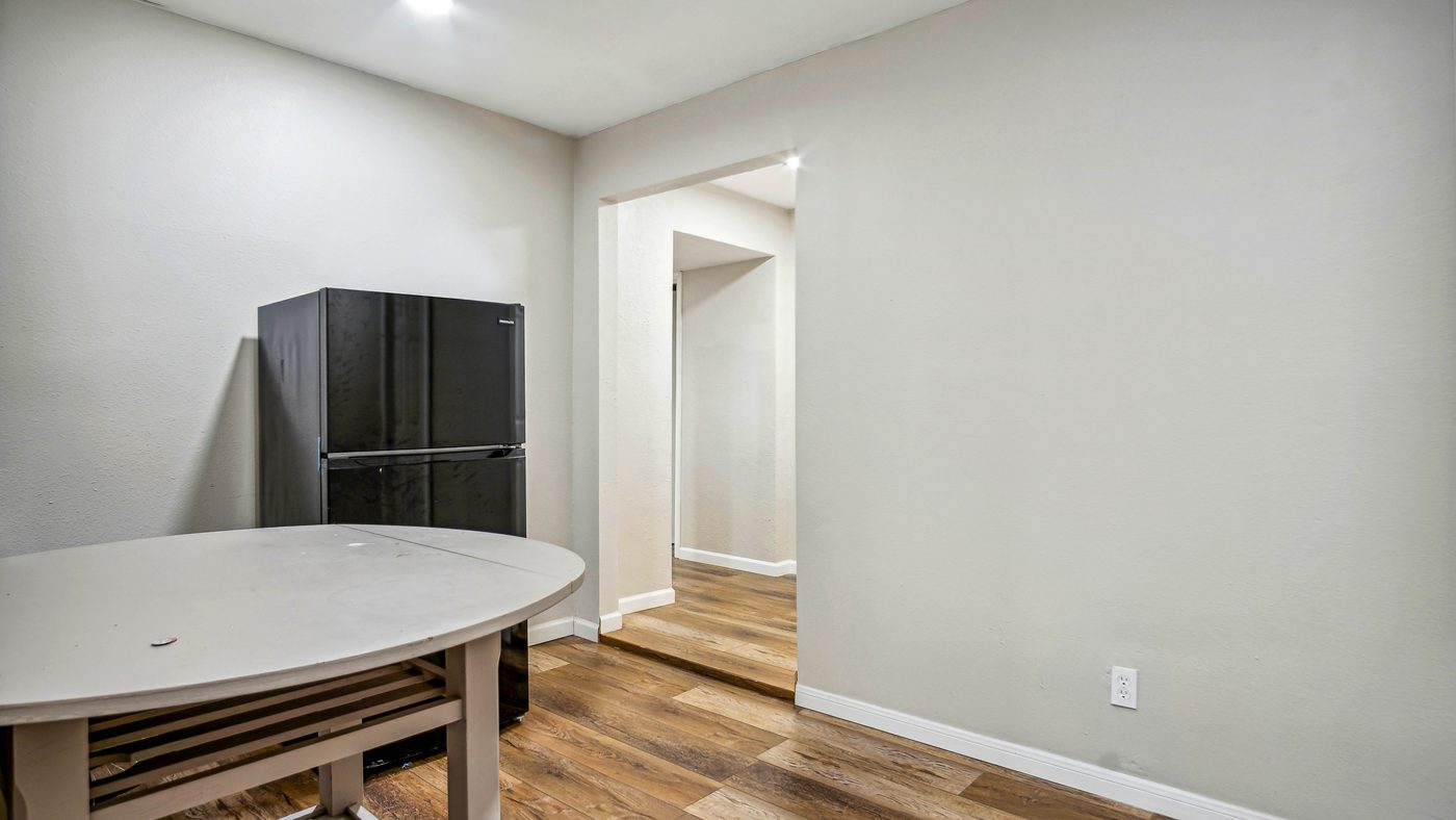 Round dining table and refrigerator at Blue Ridge