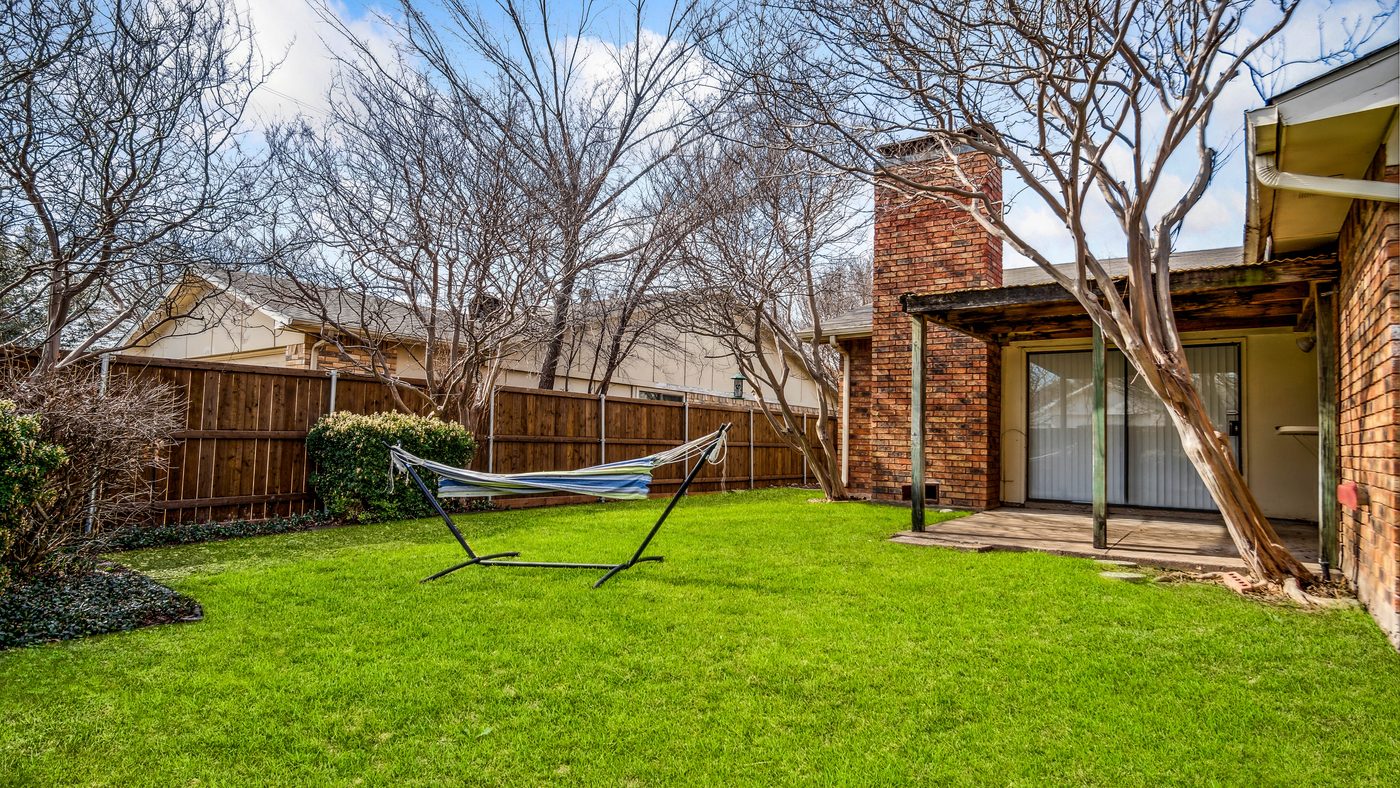 Fenced backyard with hammock at Blue Ridge