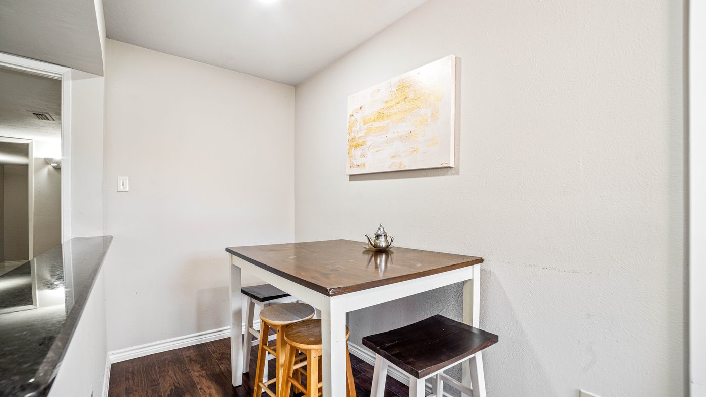 Counter-height dining table with stools at Chinaberry
