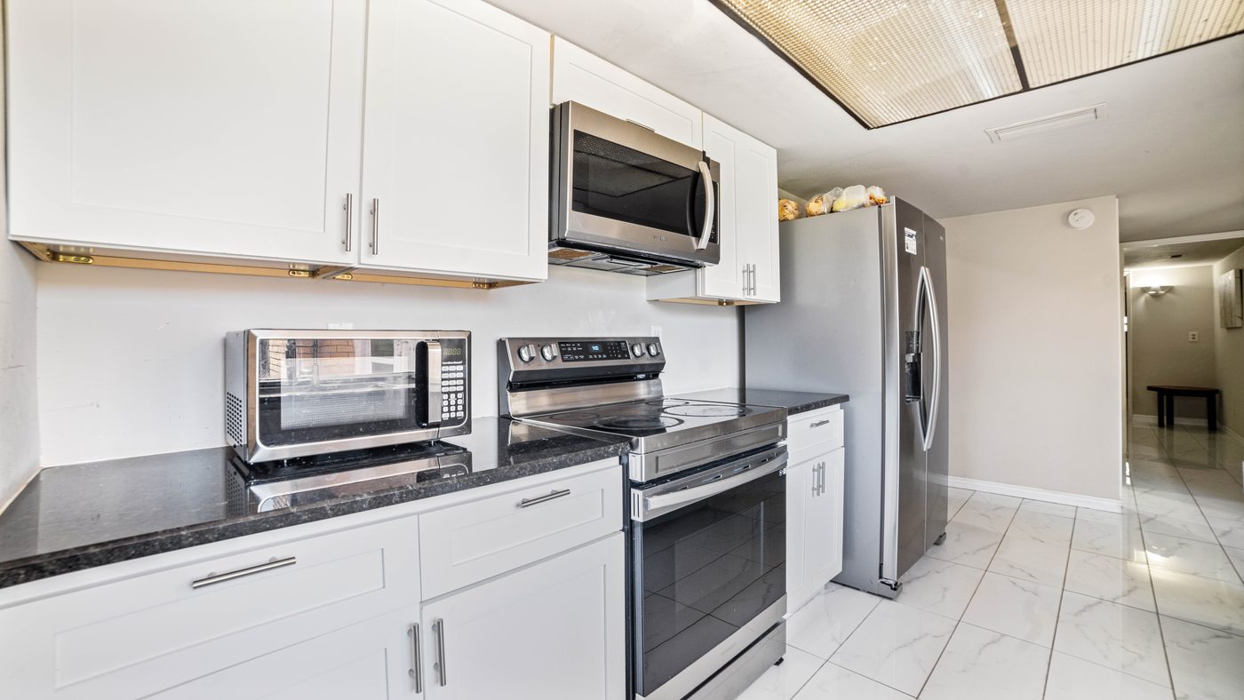 Stainless range and microwave in the Chinaberry kitchen