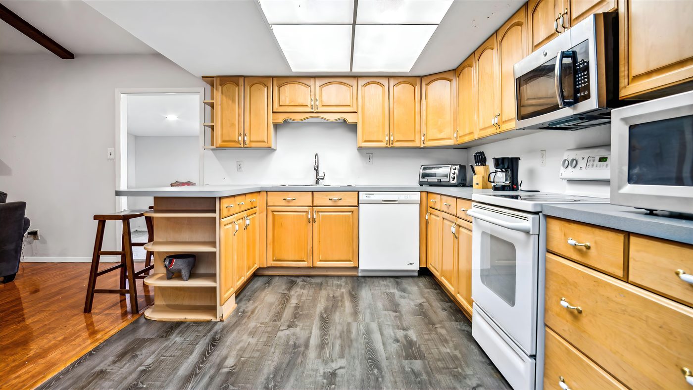 Kitchen with maple cabinets and skylight at Overdowns