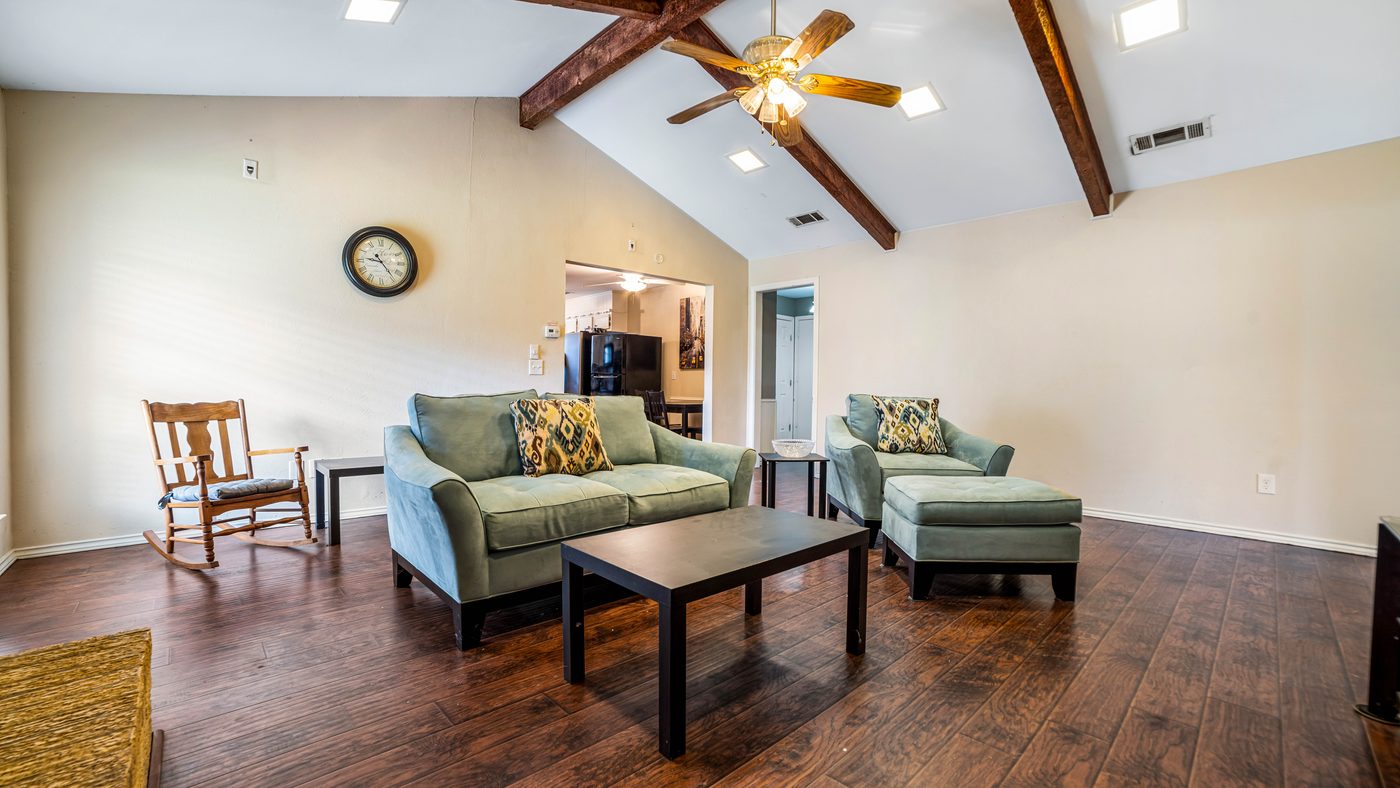 Living room seating and coffee table at Papeete