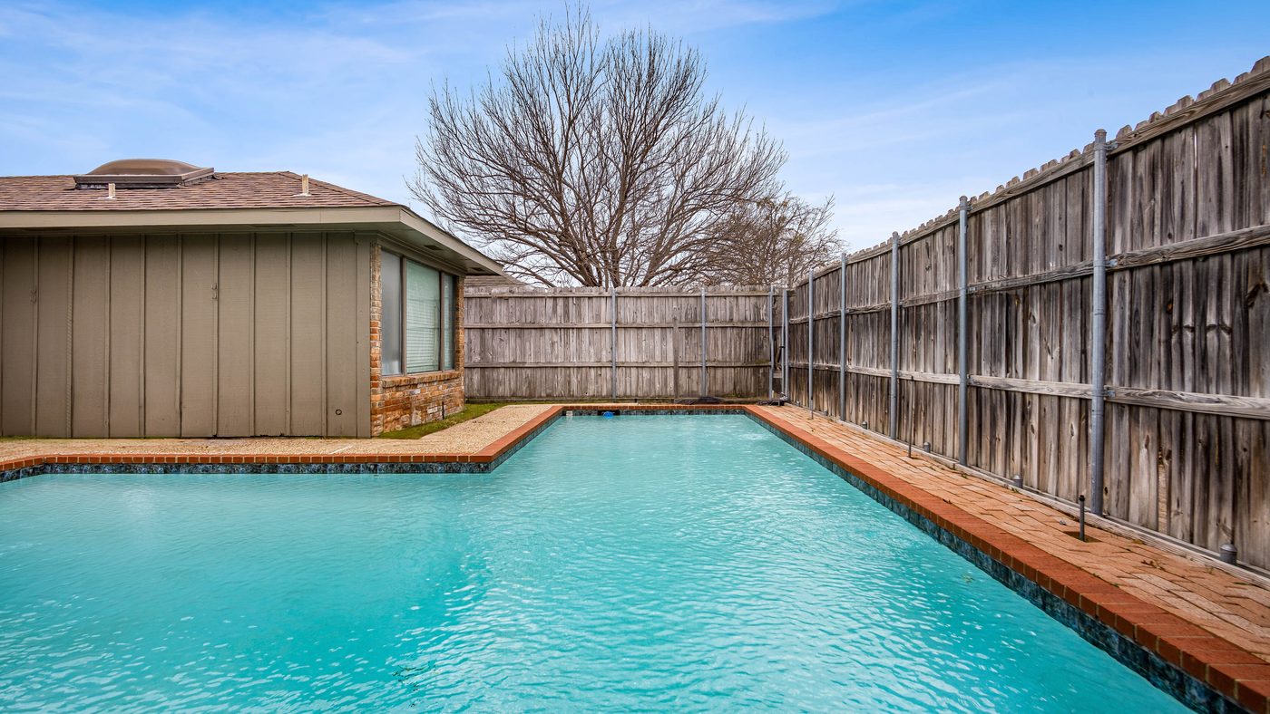 Pool with brick coping at Stain Glass